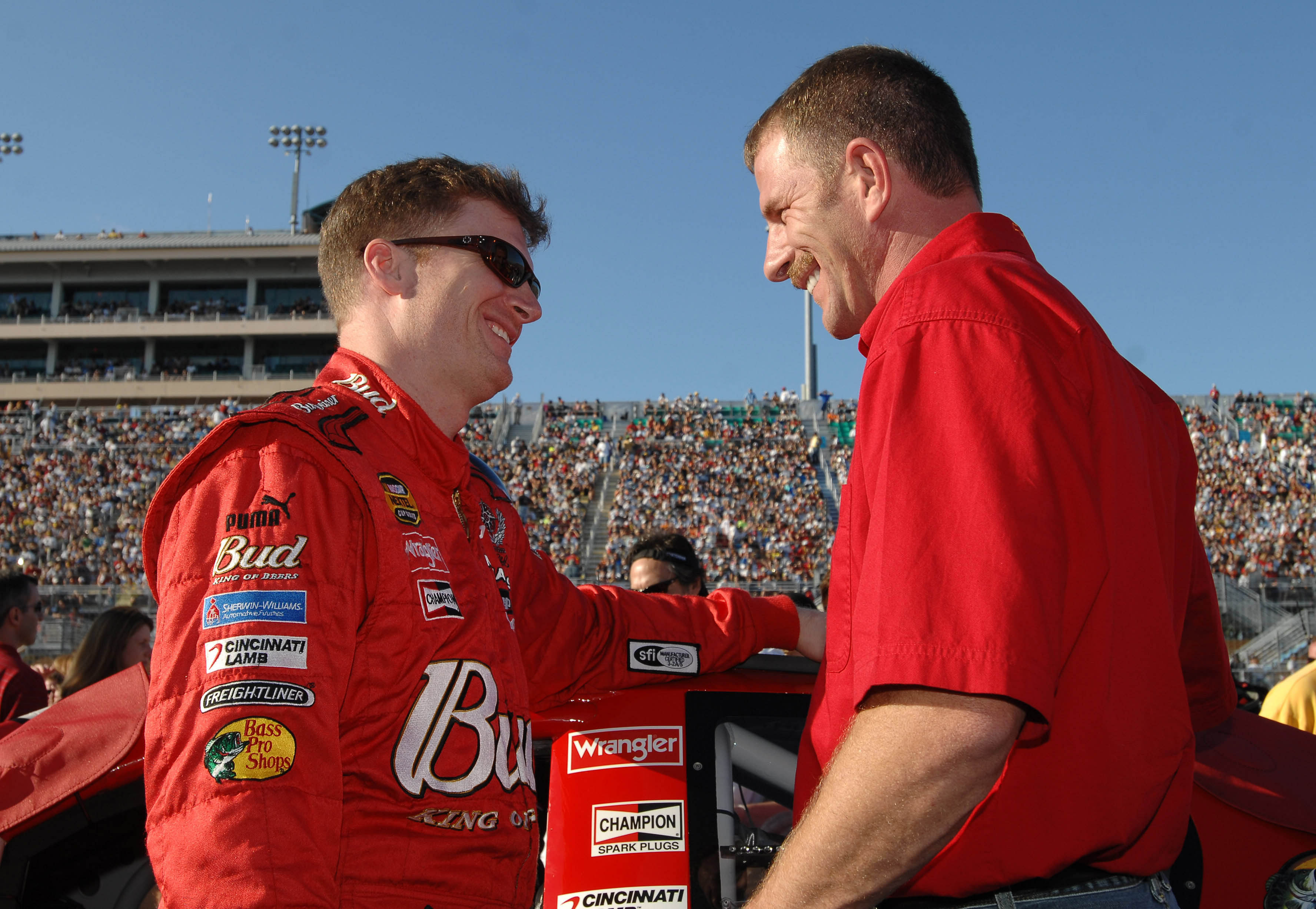 Dale Earnhardt Jr. (L) talks with his brother Kerry Earnhardt before the Ford 400 at Homestead Miami. Source: Imagn